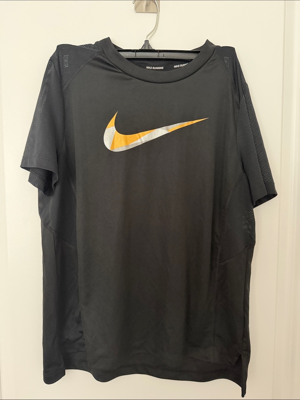 Nike Black Short-Sleeve Running Shirt with Yellow Swoosh
